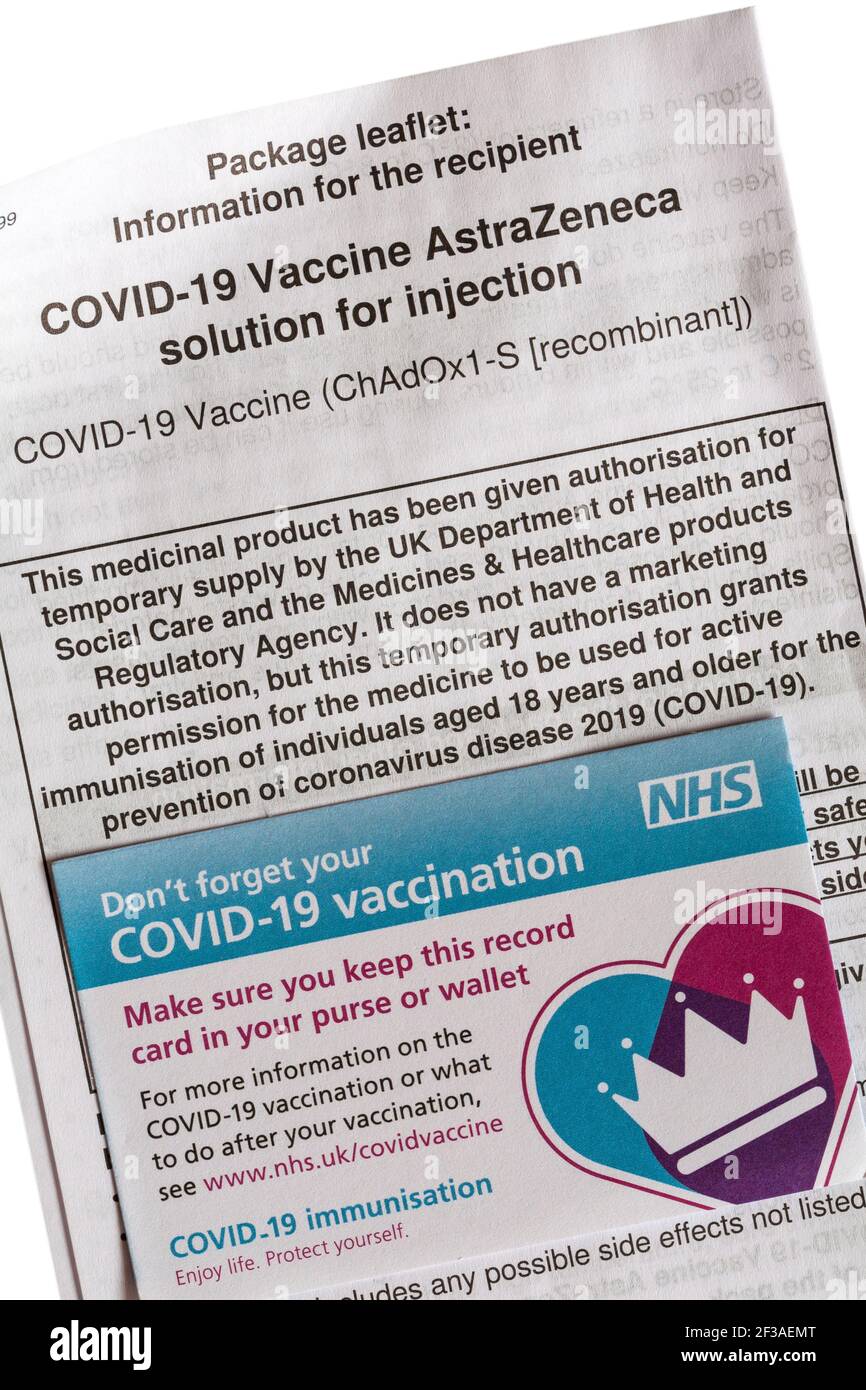 AstraZeneca vaccine information sheet with Covid-19 vaccination record card Stock Photo