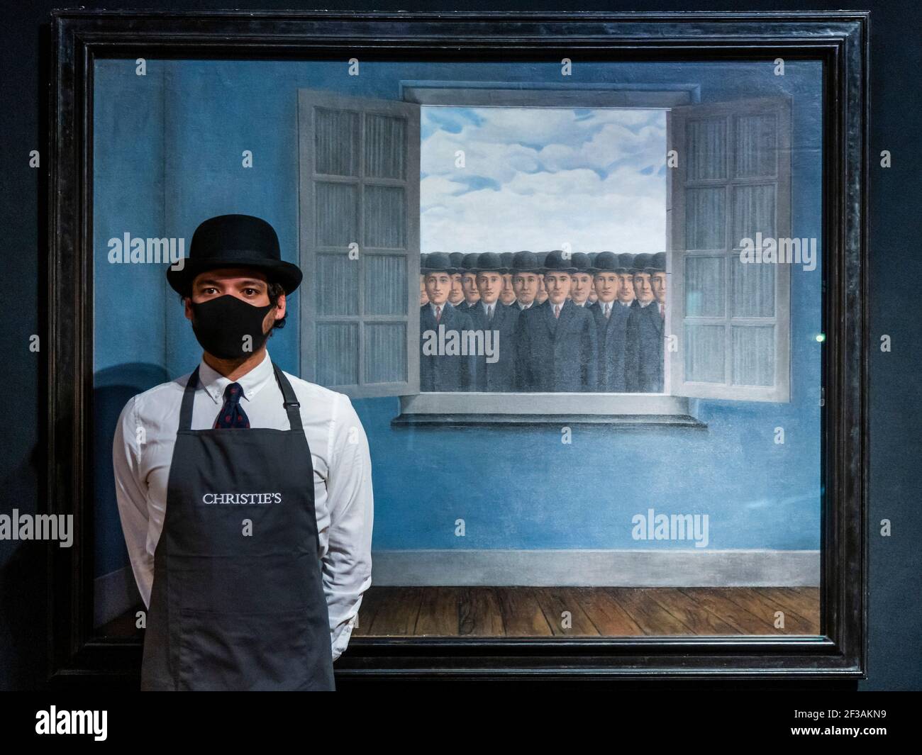 London, UK. 16th Mar, 2021. René Magritte, Le mois des vendanges, Painted in 1959 Estimate : £10,000,000-15,000,000 - Behind closed doors: preparations take place at christie's ahead of the livestreamed 20th century art evening sale and the art of the surreal sale on 23 march Credit: Guy Bell/Alamy Live News Stock Photo