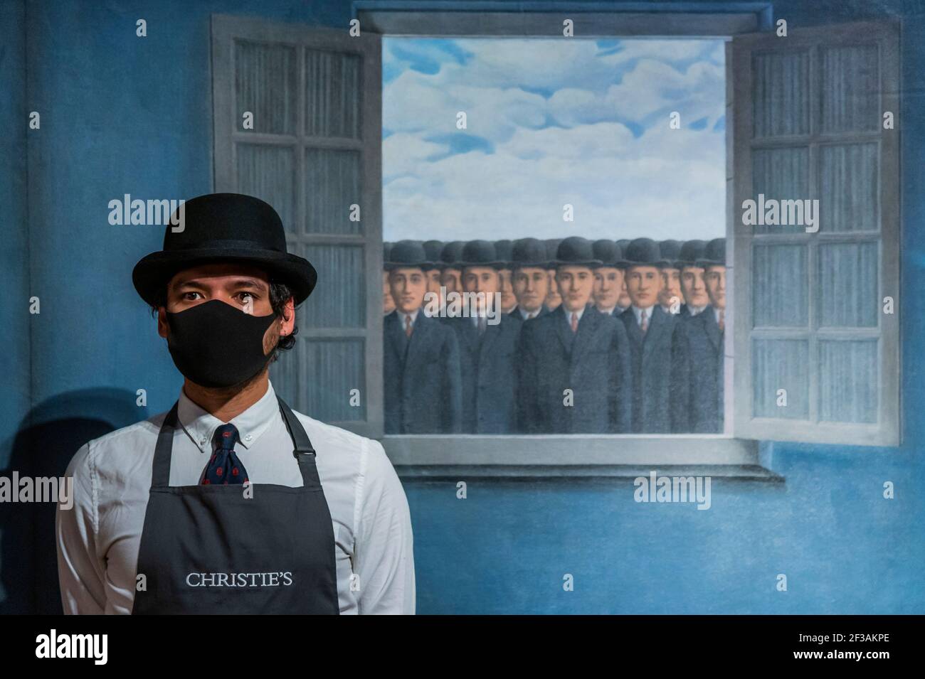 London, UK. 16th Mar, 2021. René Magritte, Le mois des vendanges, Painted in 1959 Estimate : £10,000,000-15,000,000 - Behind closed doors: preparations take place at christie's ahead of the livestreamed 20th century art evening sale and the art of the surreal sale on 23 march Credit: Guy Bell/Alamy Live News Stock Photo