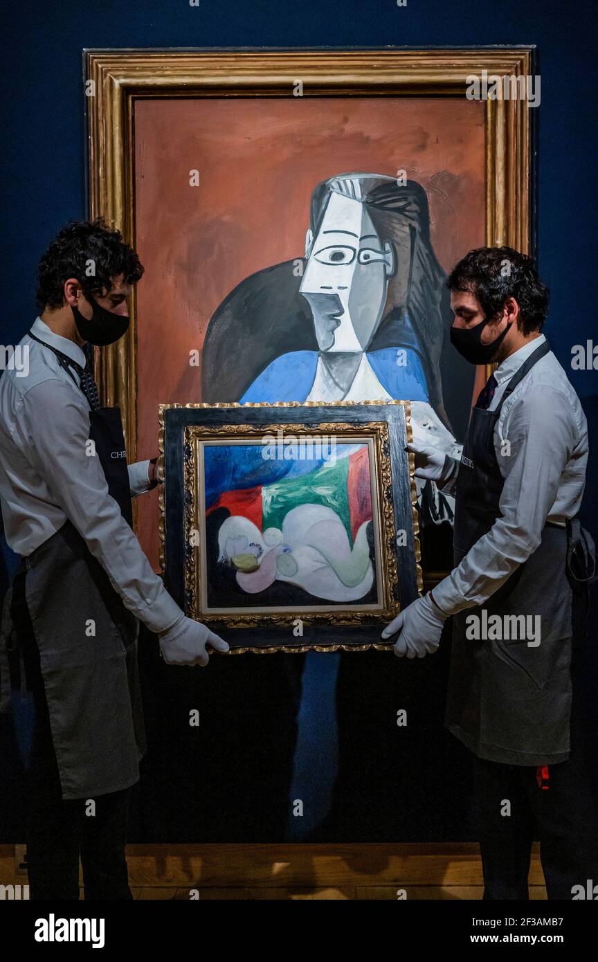 London, UK. 16th Mar, 2021. Pablo Picasso, Femme nue couchée au collier (Marie-Thérèse), Painted in Boisgeloup on 18 June 1932, Estimate : £9,000,000-15,000,000 with his Femme assise dans un fauteuil noir (Jacqueline), Painted in Mougins on 19 November & 18 December 1962, Estimate : £6,000,000-9,000,000 - Behind closed doors: preparations take place at christie's ahead of the livestreamed 20th century art evening sale and the art of the surreal sale on 23 march Credit: Guy Bell/Alamy Live News Stock Photo