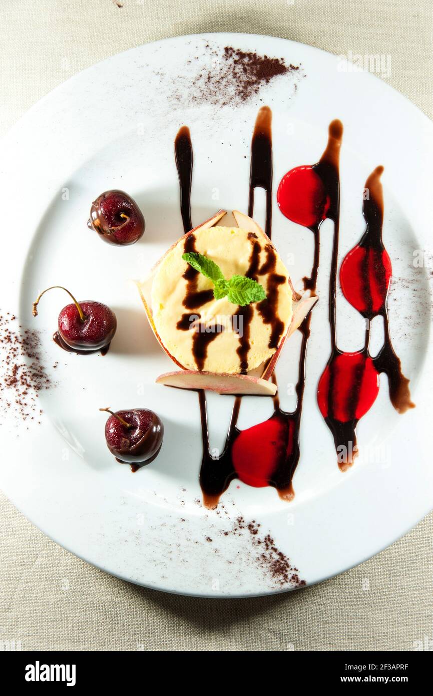Semifreddo dessert with peach sauce, parfaiy chocolate and cherries, Chef, Gianni, Di Rutigliano, Intercontinental, De La Ville, Roma, Lazio, Italy, E Stock Photo