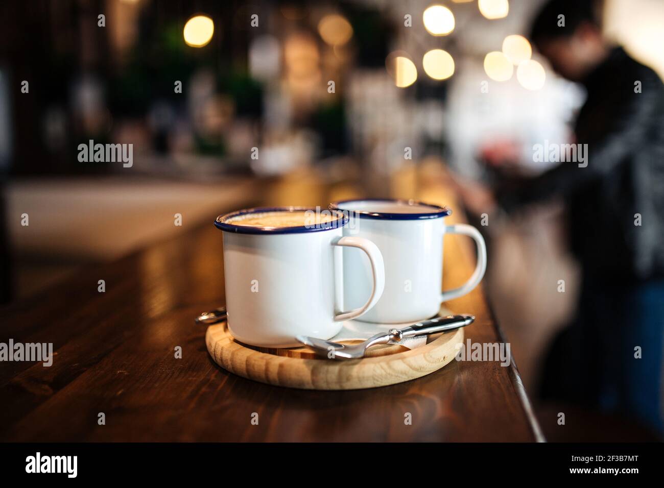 Two mugs of morning coffee on the cafe desk Stock Photo Alamy