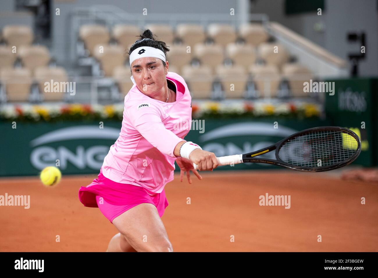 Tunesian tennis player Ons Jabeur playing a backhand shot during French Open 2020, Paris, France, Europe. Stock Photo