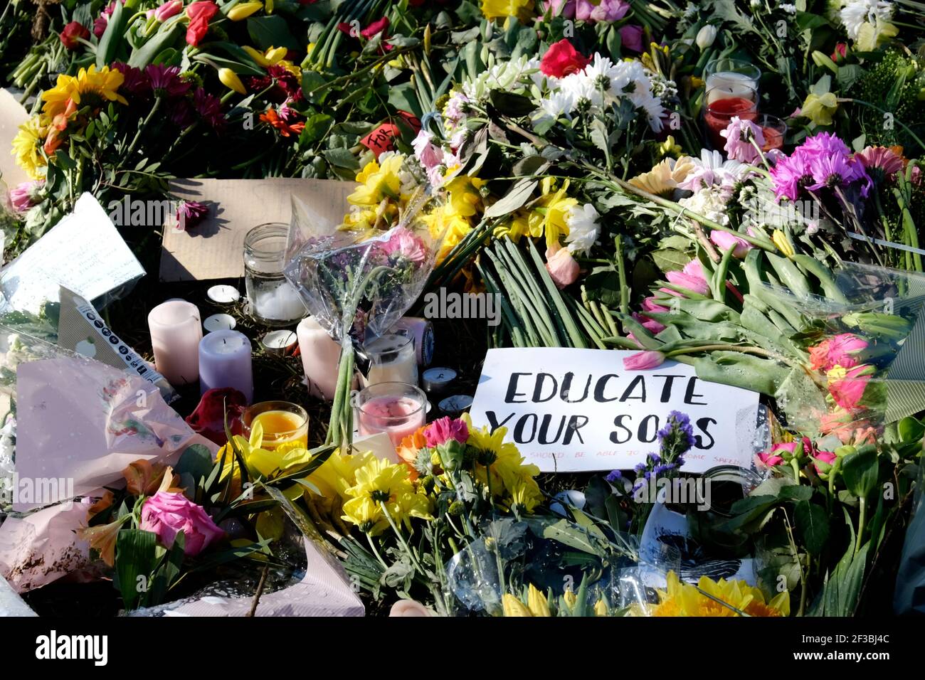 College Green, Bristol, UK. 16th Mar, 2021. Floral tributes laid during the reclaim the Streets vigil for Sarah Everard, who died in Clapham. Local women had held a vigil despite the lockdown rules. Credit: JMF News/Alamy Live News Stock Photo