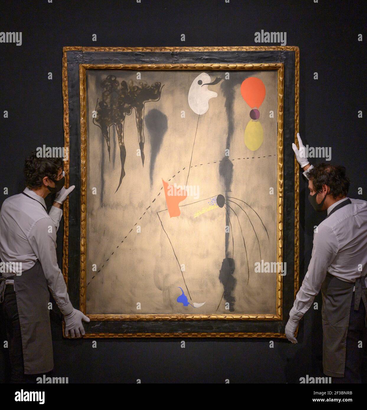 Christies, London, UK. 16 March 2021. Preparations behind closed doors for the livestreamed 20th Century Art evening sale and The Art of the Surreal sale 23 March. Image: Joan Miró, Peinture, (1925), estimate of £9,000,000-14,000,000. Credit: Malcolm Park/Alamy Live News Stock Photo