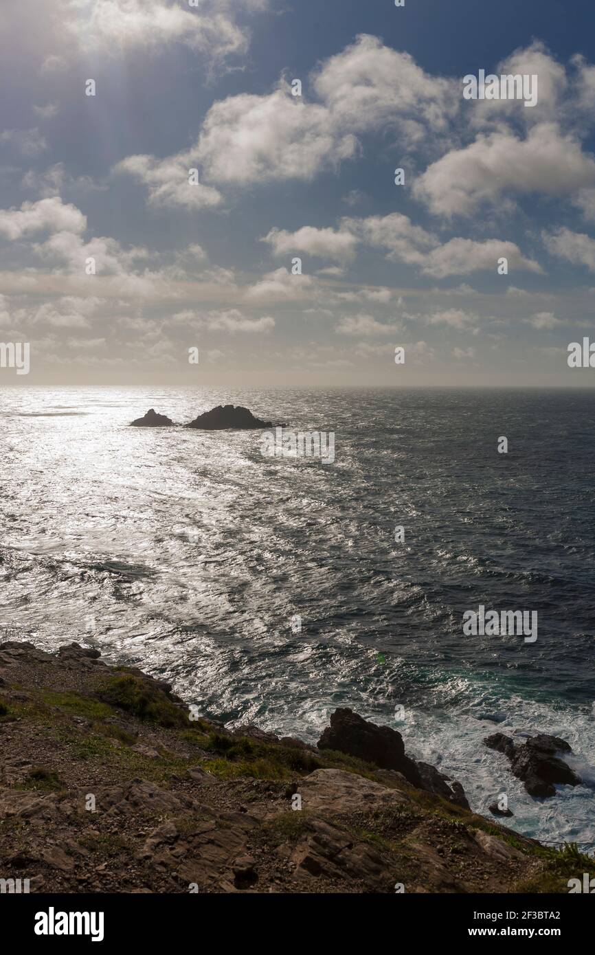 Cape Cornwall and the offshore rocks called the Brisons, West Penwith, Cornwall, UK Stock Photo