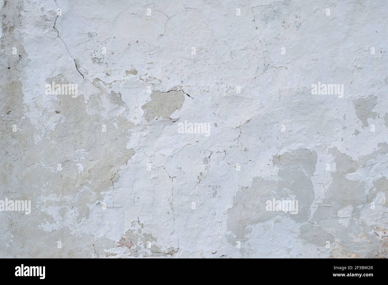 Old whitewashed lime wall, grunge background or texture Stock Photo