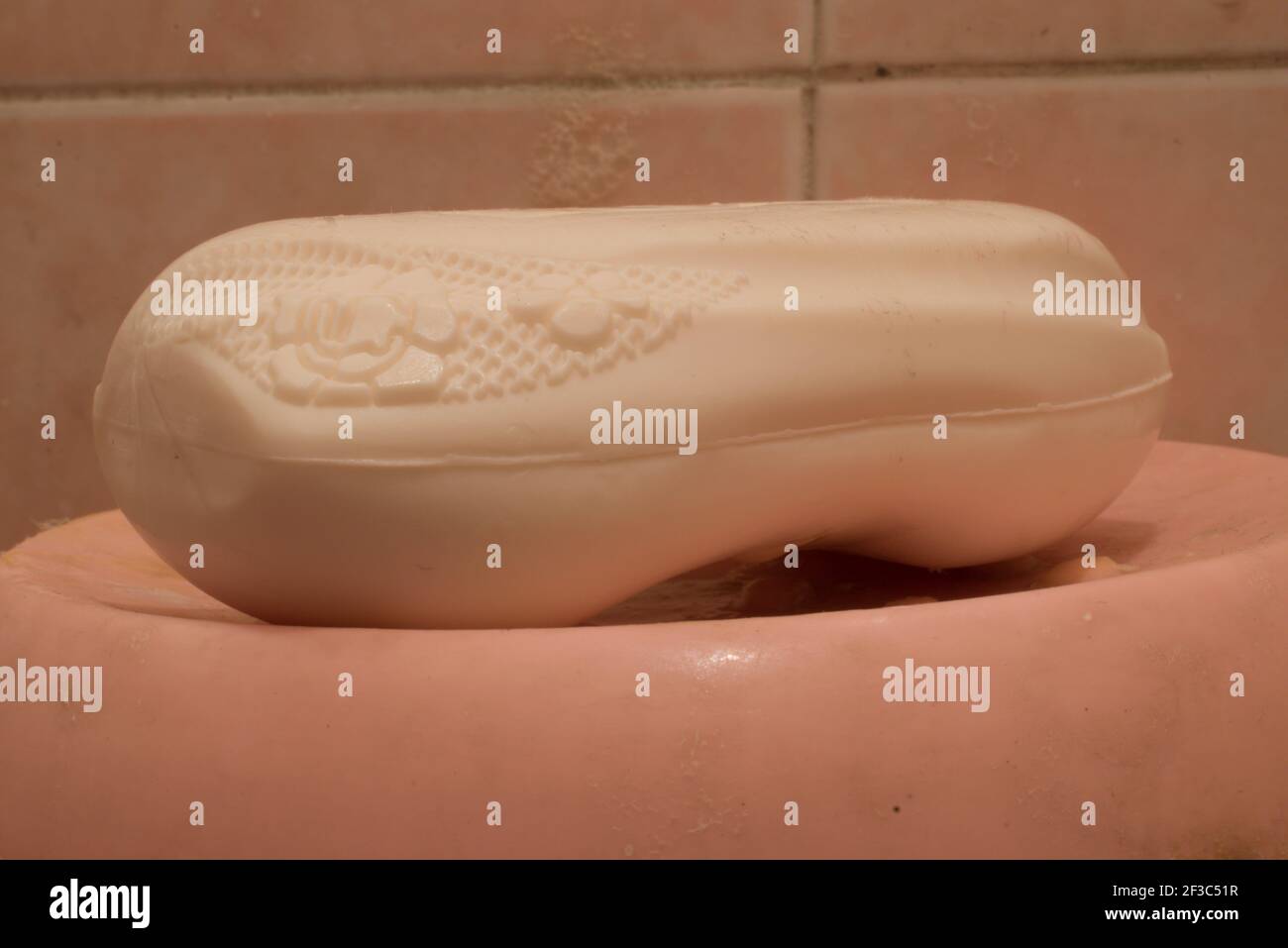 White hand washing soap bar with beautiful flower design on it Stock