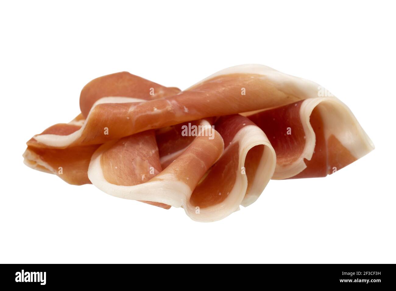 Sliced of jamon Serrano, spanish drycured ham. Folded prosciutto ham