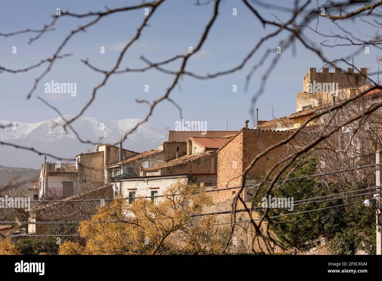 Charming photograph of the houses and rooftops in the small town of Bulbuente, in the Campo de Borja region, Zaragoza, Spain, with the Moncayo in the Stock Photo