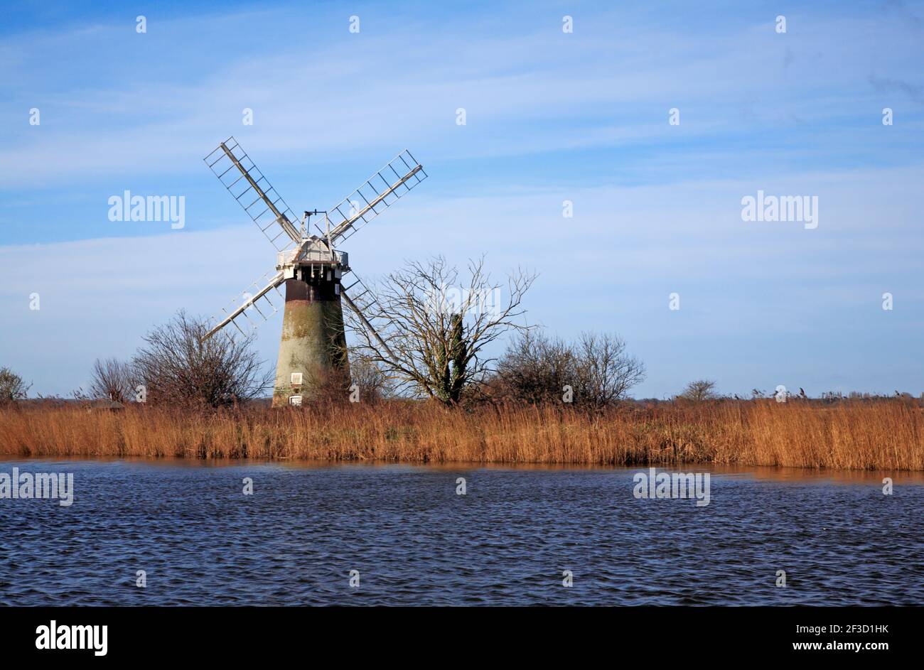 A view of St Benet's Level Drainage Mill on Horning Marshes by the River Thurne viewed from Thurne, Norfolk, England, United Kingdom. Stock Photo