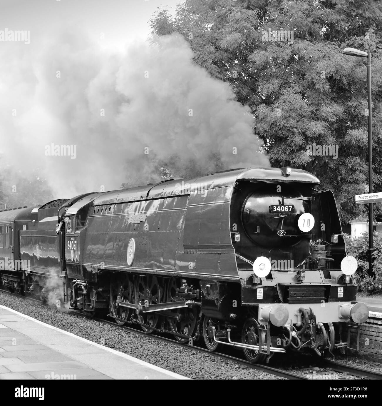 Battle of Britain class pacific No 34067 Tangmere slowing for a signal stop at Bradford-on-Avon while hauling the Weymouth Seaside Express, 17.08.2014. Stock Photo