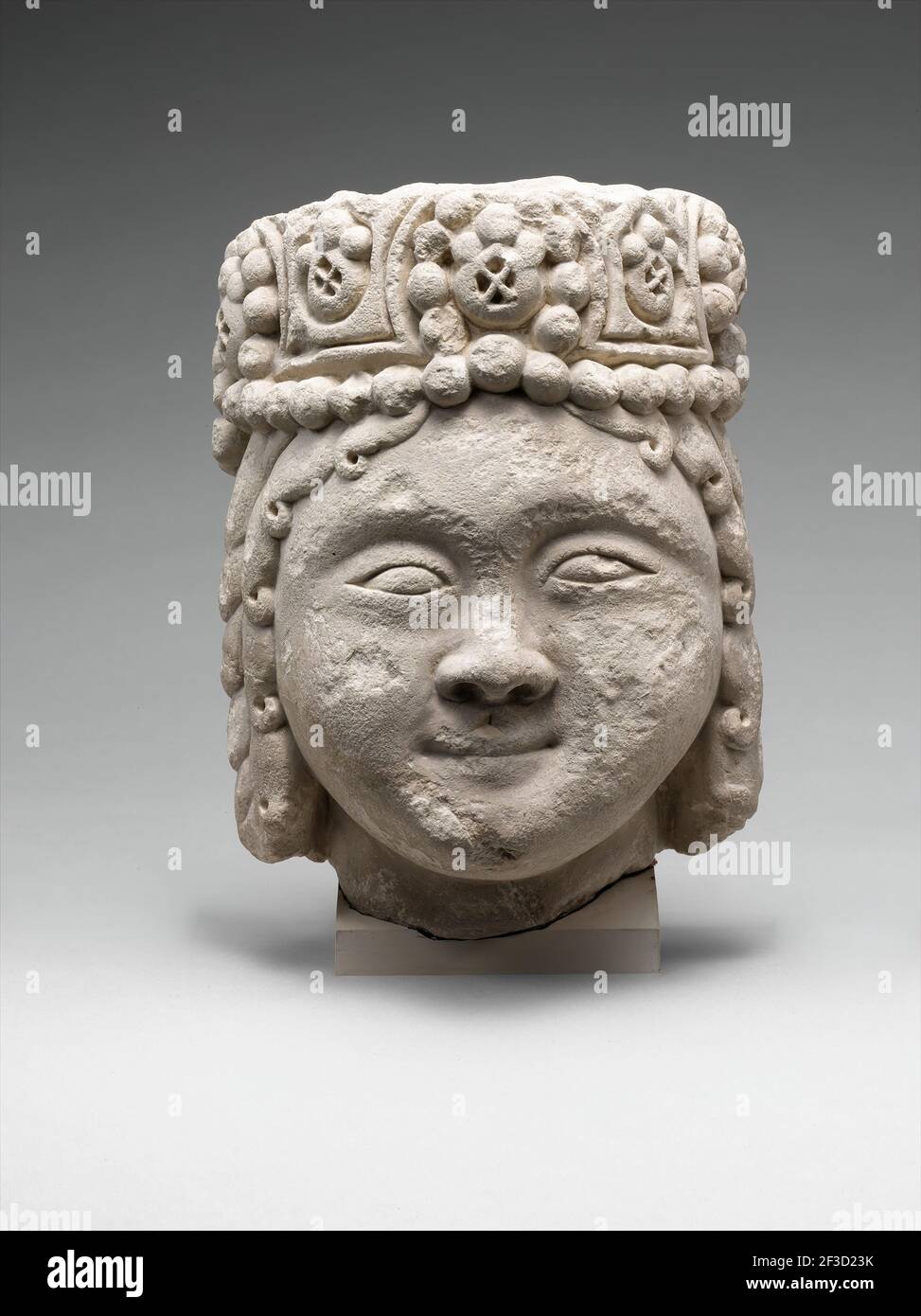 Head from a Figure with a Beaded Headdress, Iran, 12th-early 13th century. rare example from the Seljuq period. Stock Photo