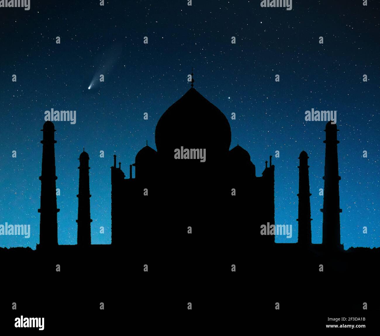Taj Mahal tomb silhouette at night sky with stars and flying comet in Agra, Uttar Pradesh, India. Free space for your text Stock Photo