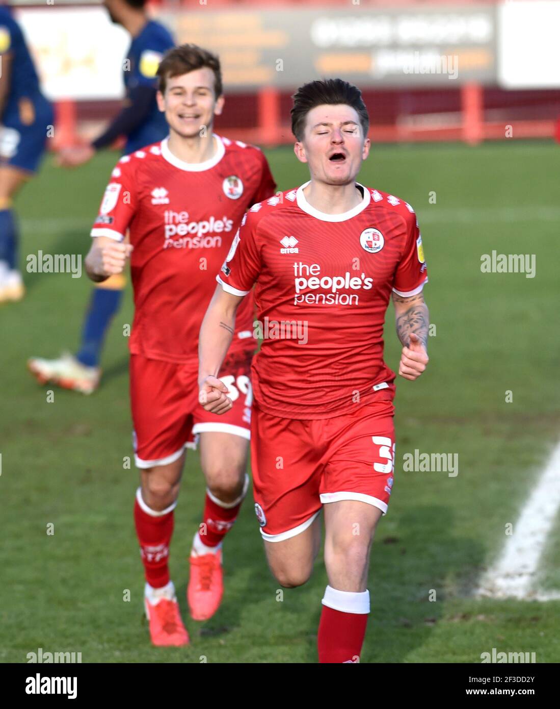 James Tilley of Crawley celebrates after scoring their late winner during the Sky Bet League Two match between Crawley Town and Mansfield Town at the People's Pension Stadium   , Crawley ,  UK - 13th March 2021 Photo Simon Dack / Telephoto Images.  - Editorial use only. No merchandising. For Football images FA and Premier League restrictions apply inc. no internet/mobile usage without FAPL license - for details contact Football Dataco Stock Photo