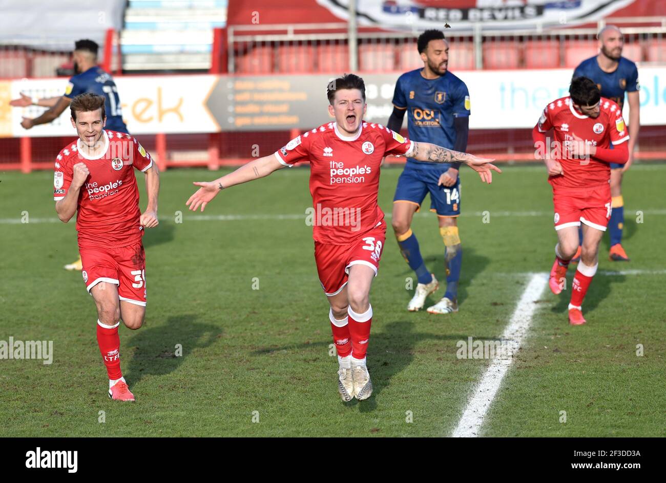 James Tilley of Crawley celebrates after scoring their late winner during the Sky Bet League Two match between Crawley Town and Mansfield Town at the People's Pension Stadium   , Crawley ,  UK - 13th March 2021 Photo Simon Dack / Telephoto Images.  - Editorial use only. No merchandising. For Football images FA and Premier League restrictions apply inc. no internet/mobile usage without FAPL license - for details contact Football Dataco Stock Photo