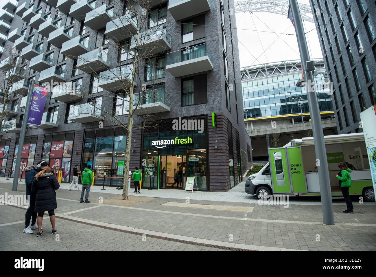 London, UK. 16 March 2021. Outside the new 2,500 sq ft Amazon Fresh store  in Wembley Park, west London on its opening day. It is the second “just  walk out” grocery store