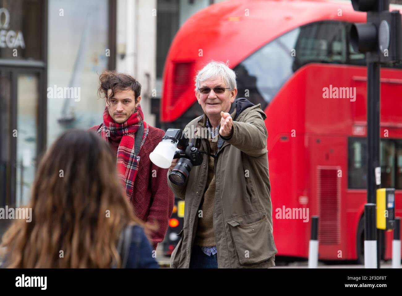 Martin Parr photographer at work in Oxford Street London, Martin Parr is a British documentary photographer, and  photojournalist Stock Photo