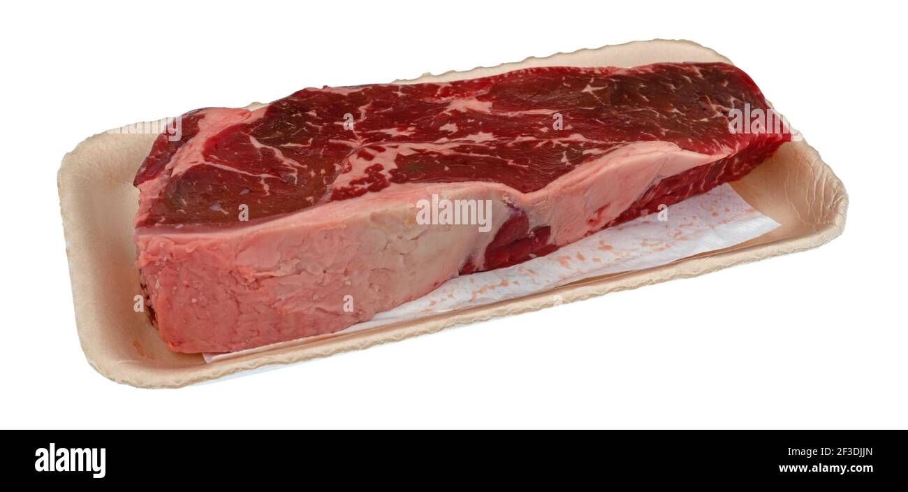 Beef loin boneless end cut strip steak on a foam tray side view. Stock Photo