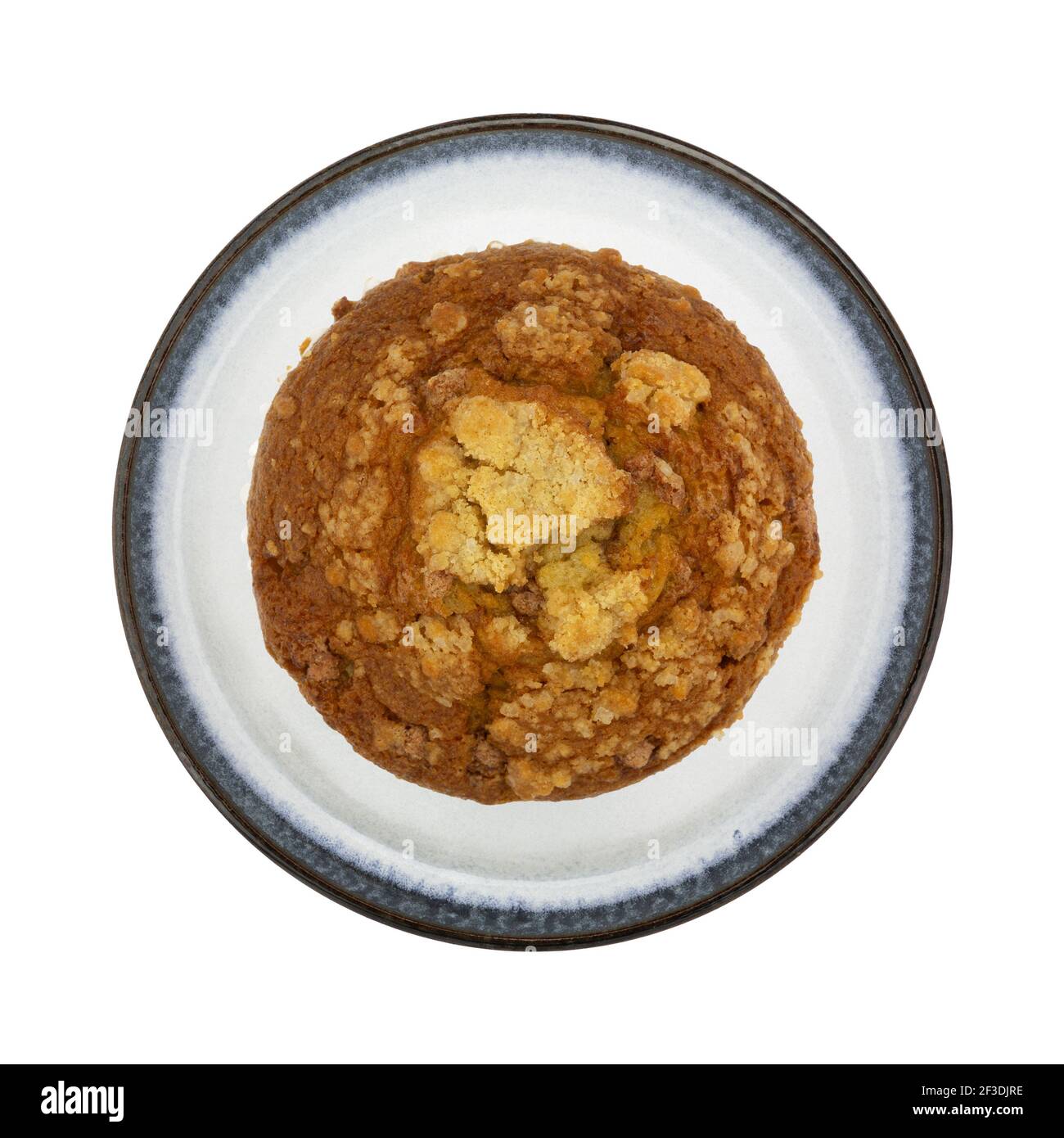 Single cinnamon crumb muffin on an isolated on a white background top view. Stock Photo