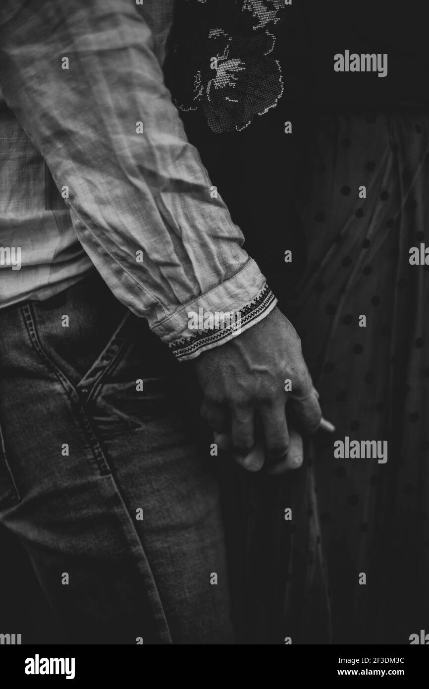 Young couple holding hand in Black and White Stock Photos & Images - Alamy