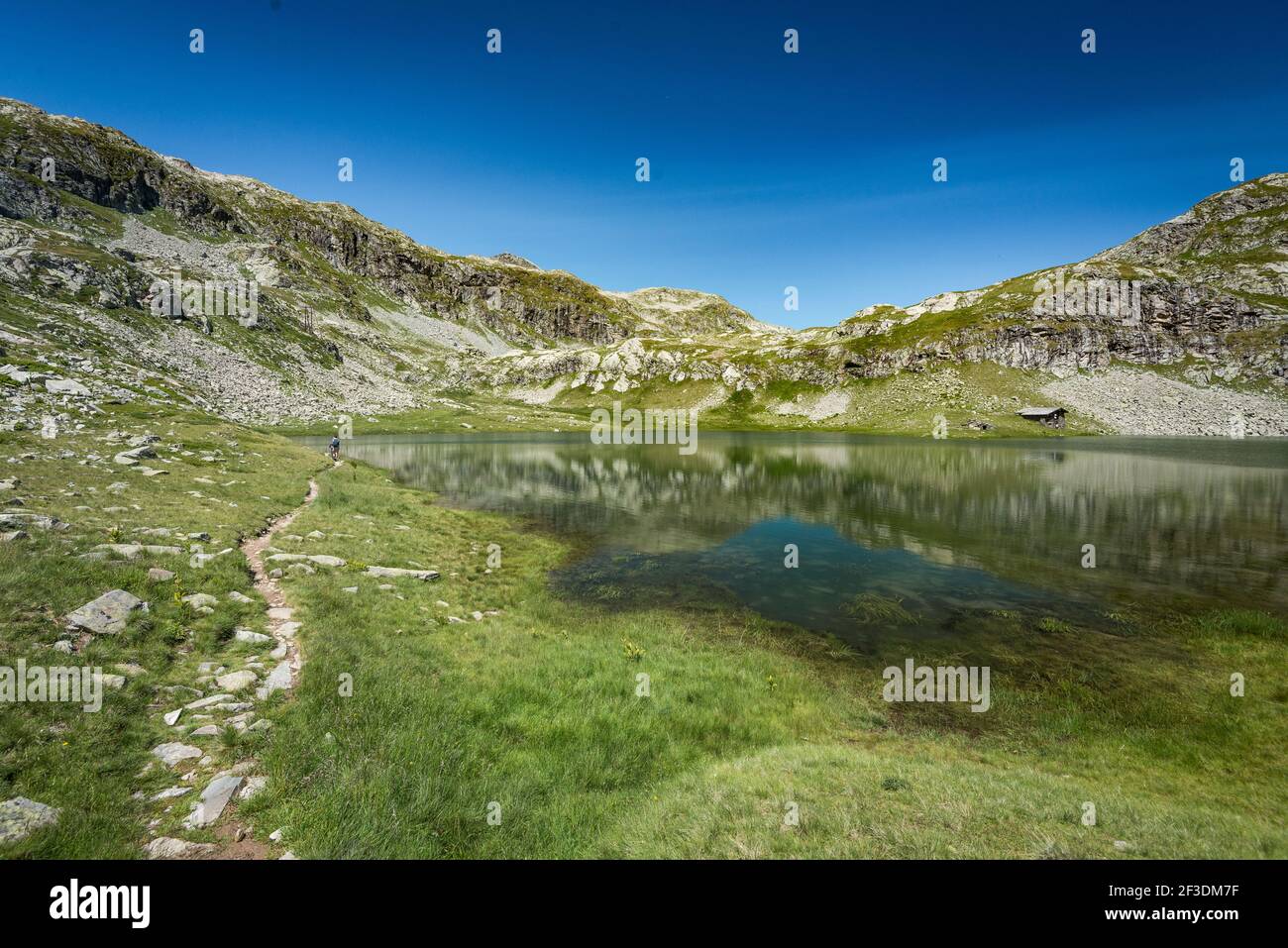 Refreshing view of Chambery Mountains with lake in summer Stock Photo