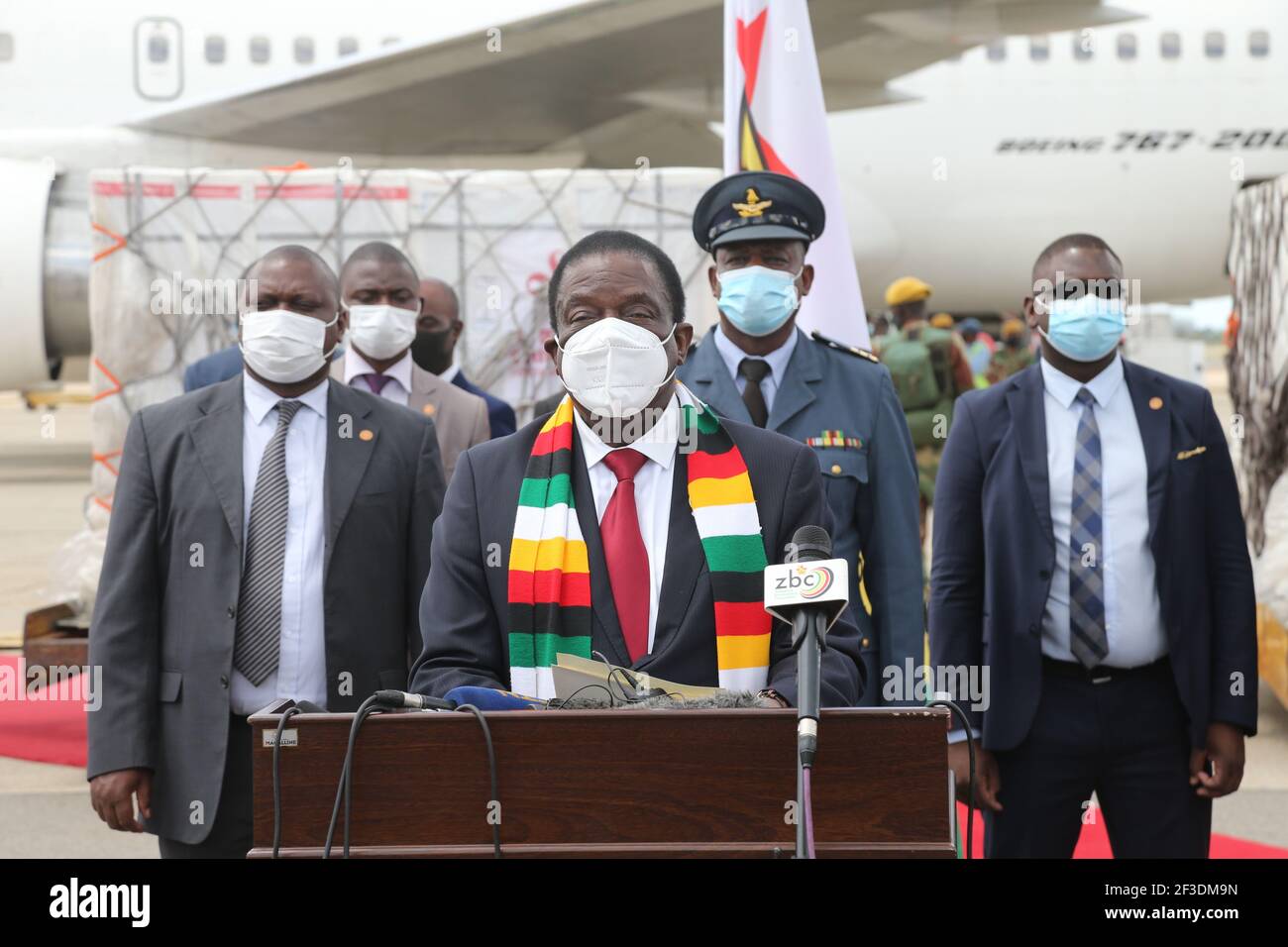 Harare, Zimbabwe. 16th Mar, 2021. Zimbabwean President Emmerson Mnangagwa delivers a speech as a batch of COVID-19 vaccines arrive at Robert Gabriel Mugabe International Airport in Harare, Zimbabwe, March 16, 2021. Zimbabwe on Tuesday received a second batch of Sinopharm doses donated by China plus an additional Sinovac doses commercially procured by the government. Credit: Zhang Yuliang/Xinhua/Alamy Live News Stock Photo