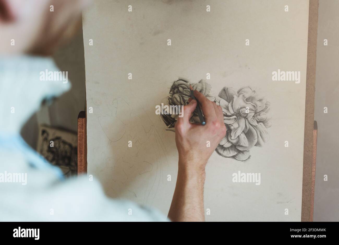 Hand artist painting white flower hi-res stock photography and images ...