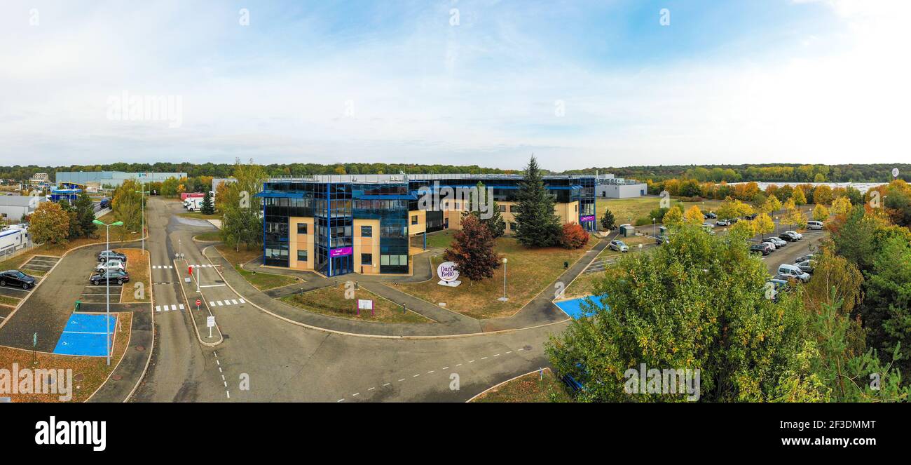 Wide view of modern office building in industrial of logistic park from drone. Industry, transport and logistics. Stock Photo