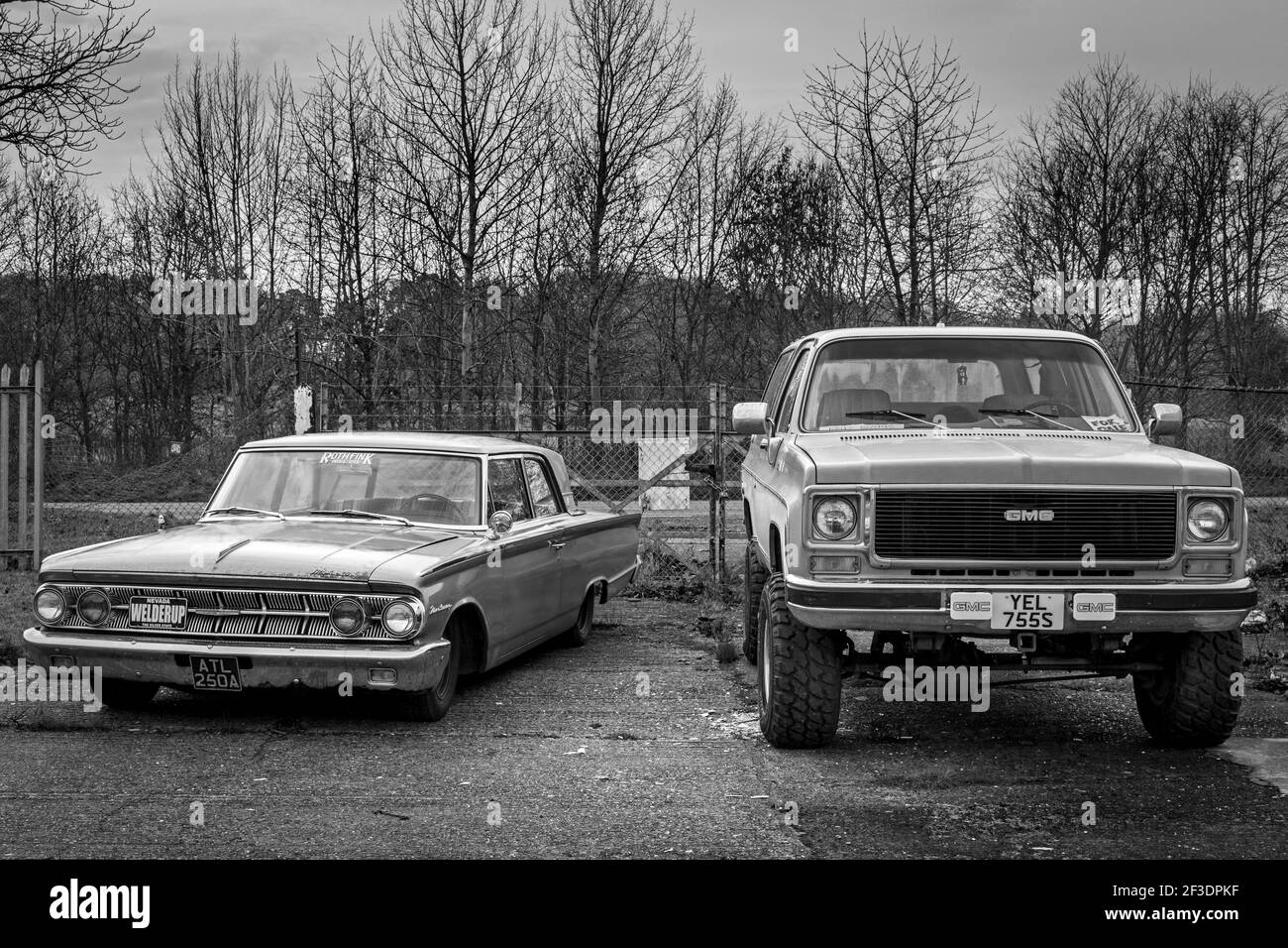 1963 Mercury Monterey and 1978 GMC Jimmy Sierra on display at the Lenwade Industrial Estate, Norfolk, UK. Stock Photo