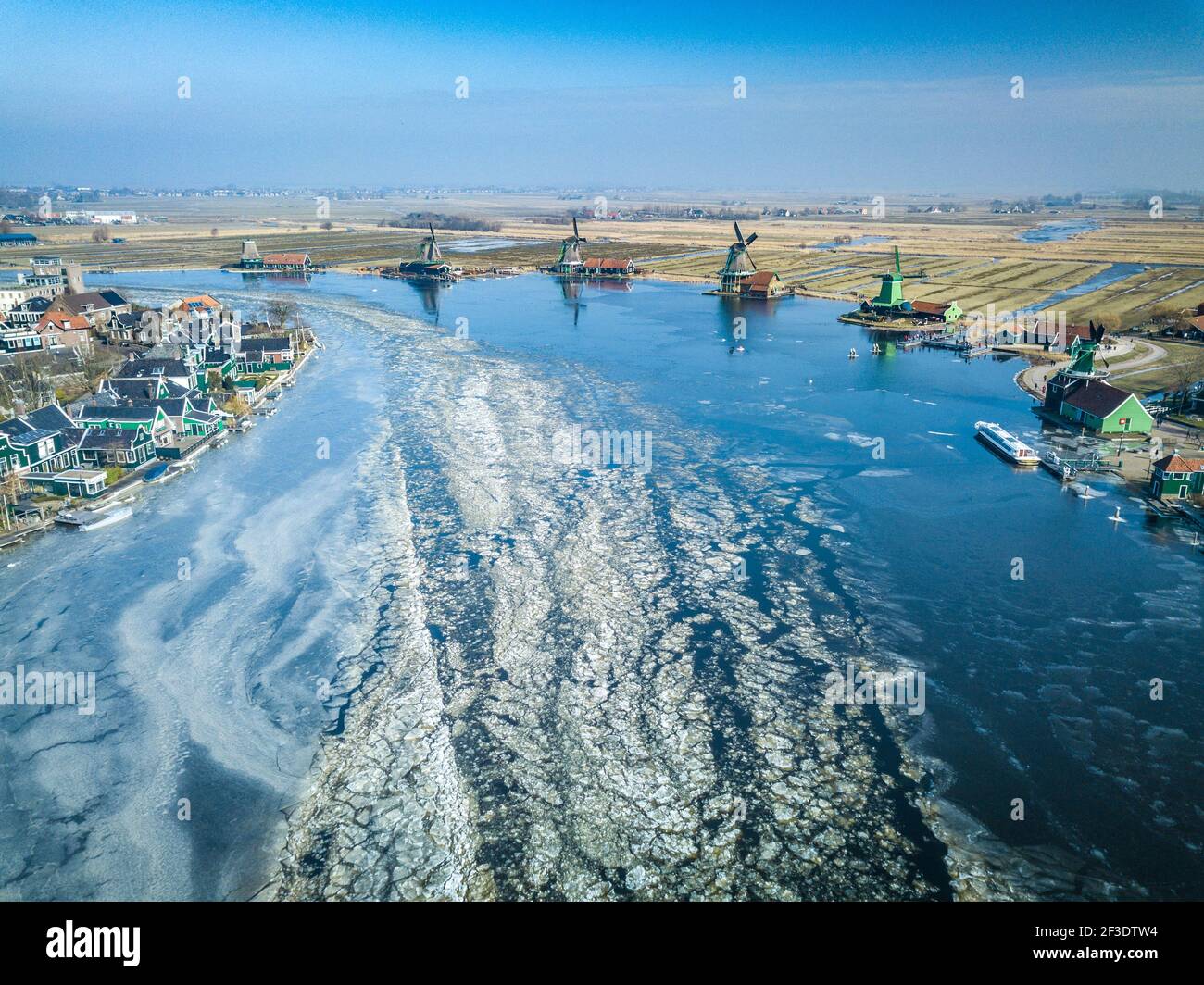 Turning Rivers Drone view on turning river with surface covered with floating ice ...