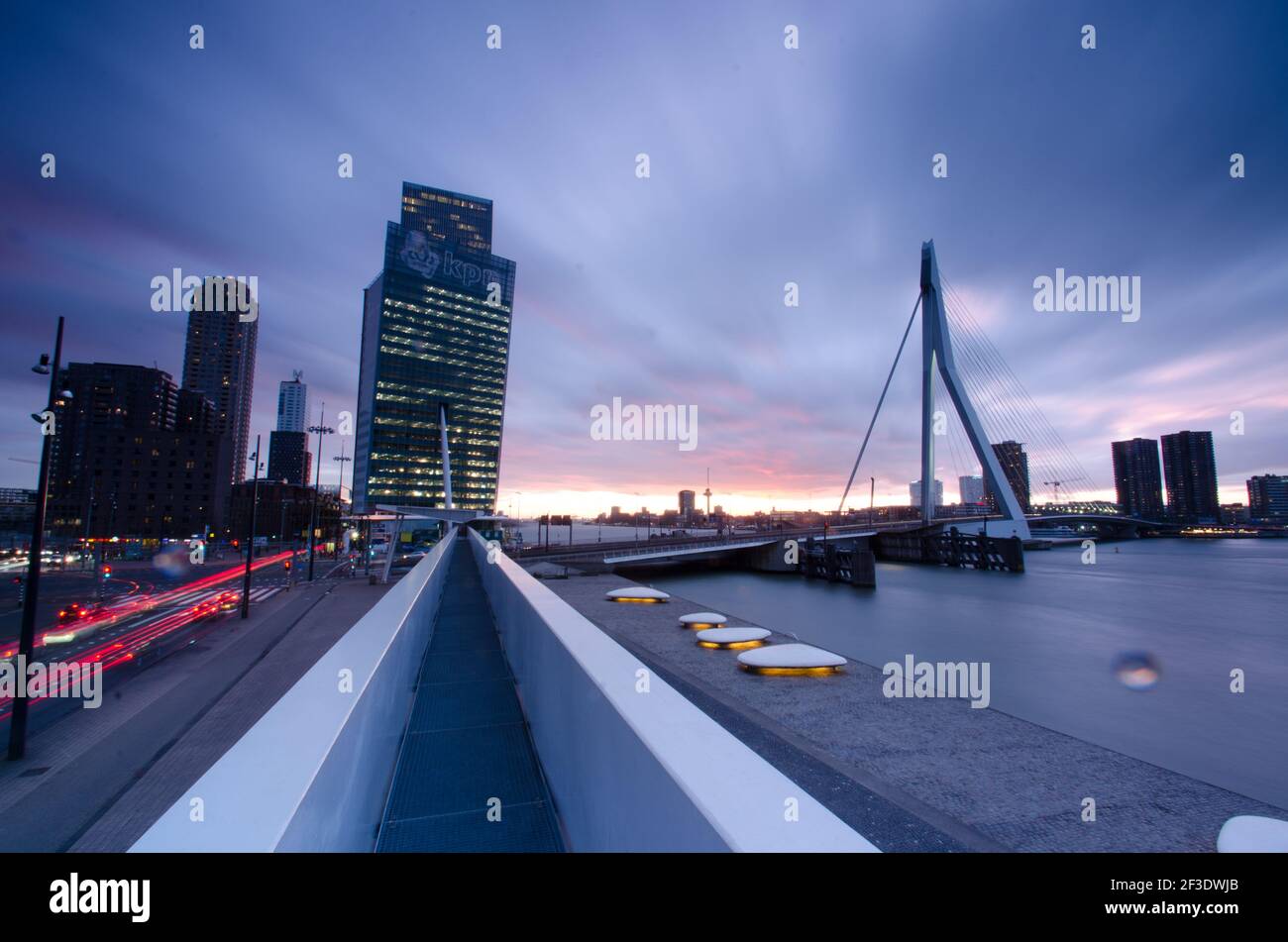 Modern tall buildings and Erasmus bridge in Rotterdam, Netherlands.  Panoramic view in twilight time Stock Photo - Alamy