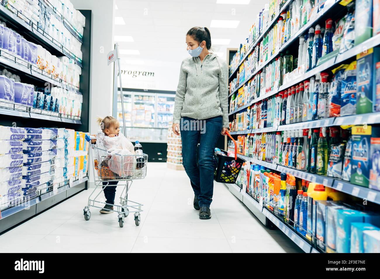 Budva, Montenegro - 17 march 2021: A child with a small trolley in the  supermarket, go shopping with his mother. The family goes shopping Stock  Photo - Alamy