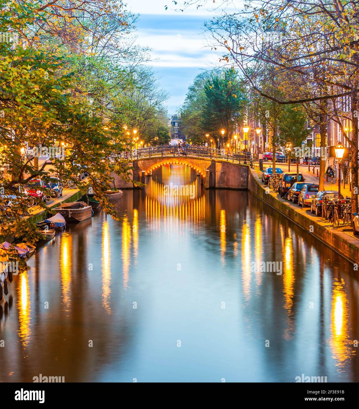 canal at night in Amsterdam in Holland, Netherlands Stock Photo