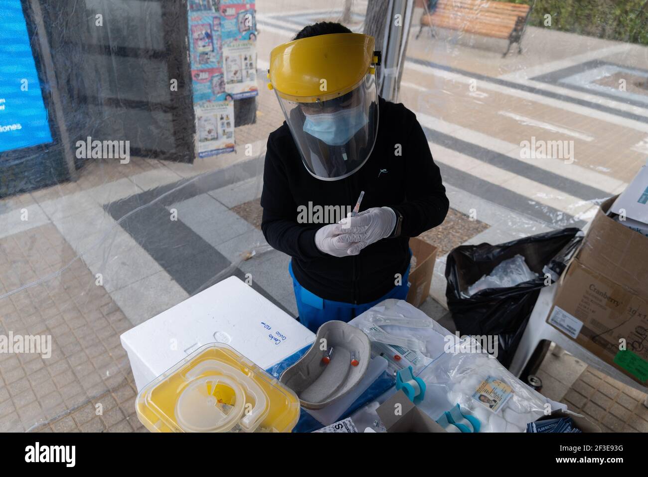 Santiago, Metropolitana, Chile. 16th Mar, 2021. A nurse prepares a dose of the Sinovac vaccine for COVID 19 at a drive-thru vaccination site in Santiago, Chile. So far, almost 5 million people have been vaccinated in the country, and 41% of them with the second dose. Credit: Matias Basualdo/ZUMA Wire/Alamy Live News Stock Photo