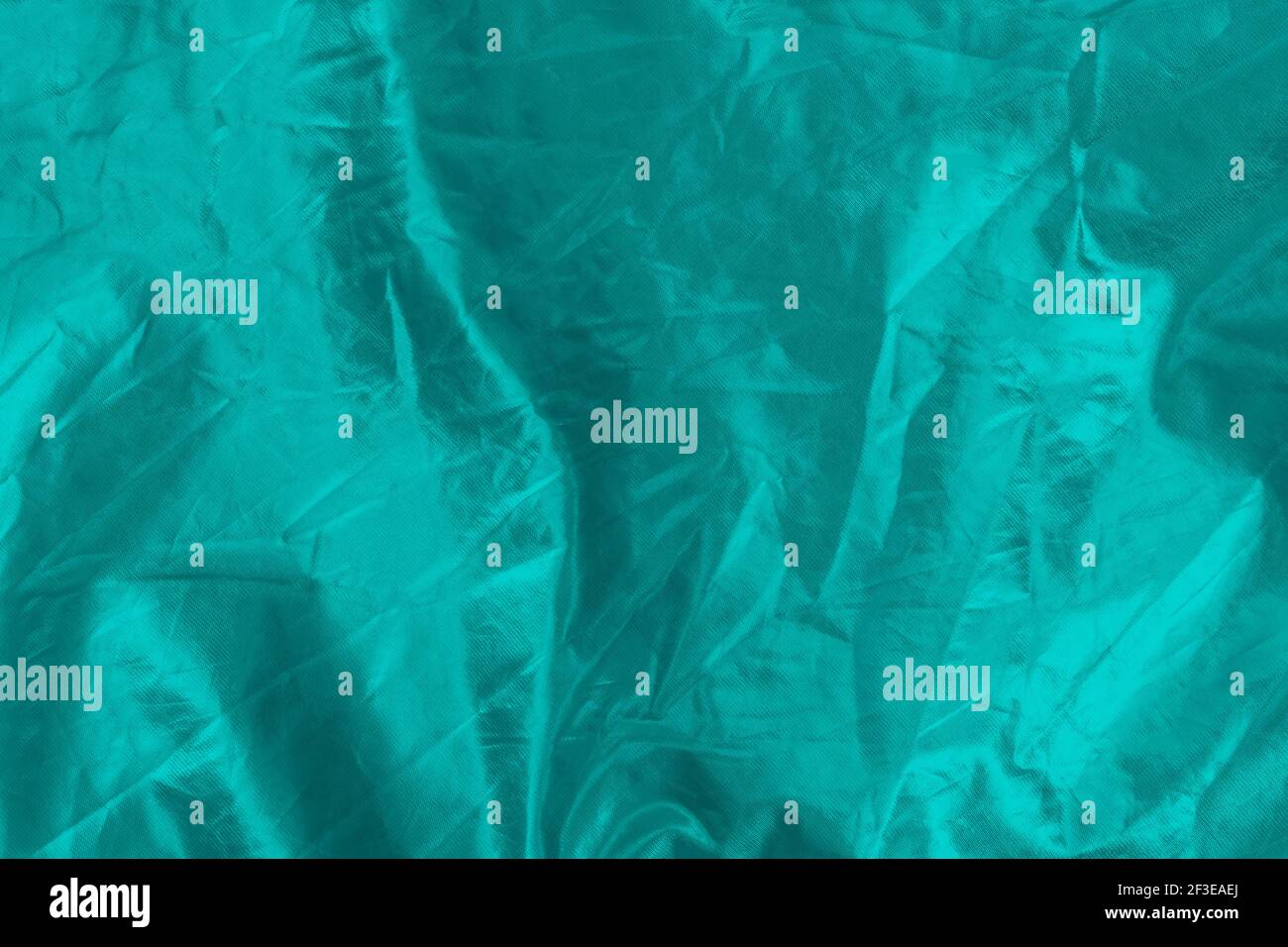 Green glowing textured background, selective focus, empty space for text Stock Photo