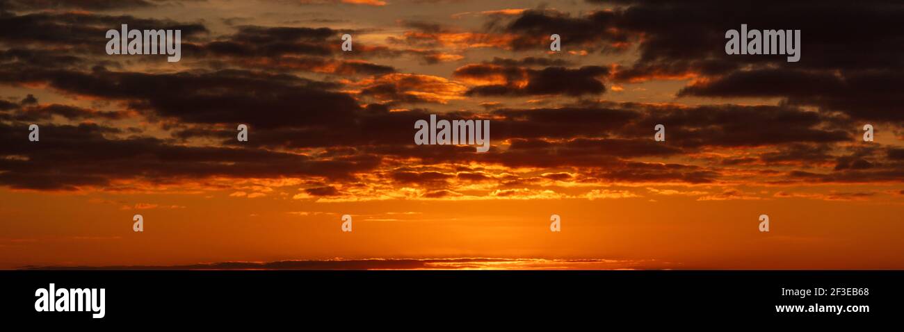 Panoramic sunset and clouds panorama web banner header Stock Photo