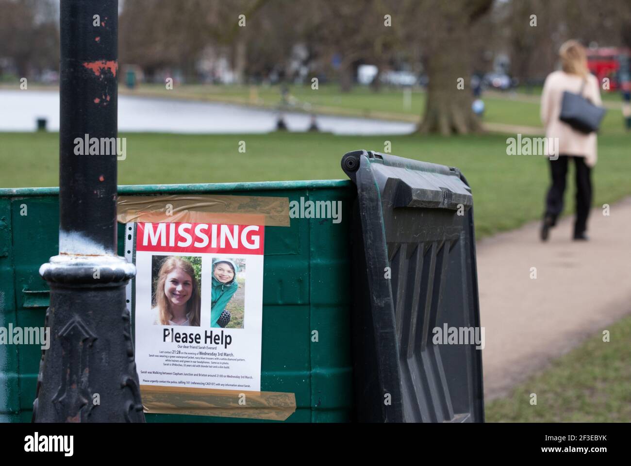 London, UK. 16th Mar, 2021. A 'Missing' sign for Sarah Everard taped to a bin. People continue to leave tributes and flowers for Sarah Everard at the bandstand on Clapham Common which has become a shrine. Sarah was last seen on March 3rd. Her body was found in a builders' bag in Woodland at Ashord. PC Wayne Couzens appeared at the Old Bailey via videolink from Belmarsh prison today. He will go on trial in October. Credit: Mark Thomas/Alamy Live News Stock Photo