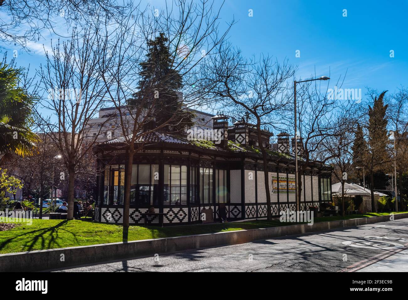 Madrid, Spain - February 14, 2021: Cafe el Espejo in Paseo de Recoletos. It is and art nouveau-style pavilion with terrace in mail boulevard of Madrid Stock Photo