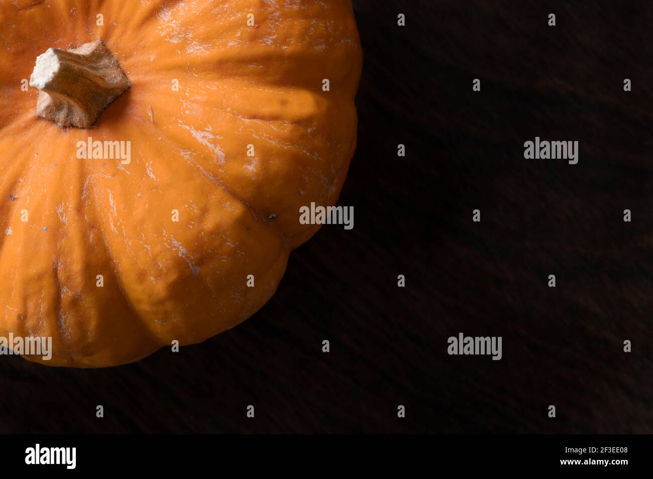 Orange Pumpkin on Black Background Stock Photo - Alamy