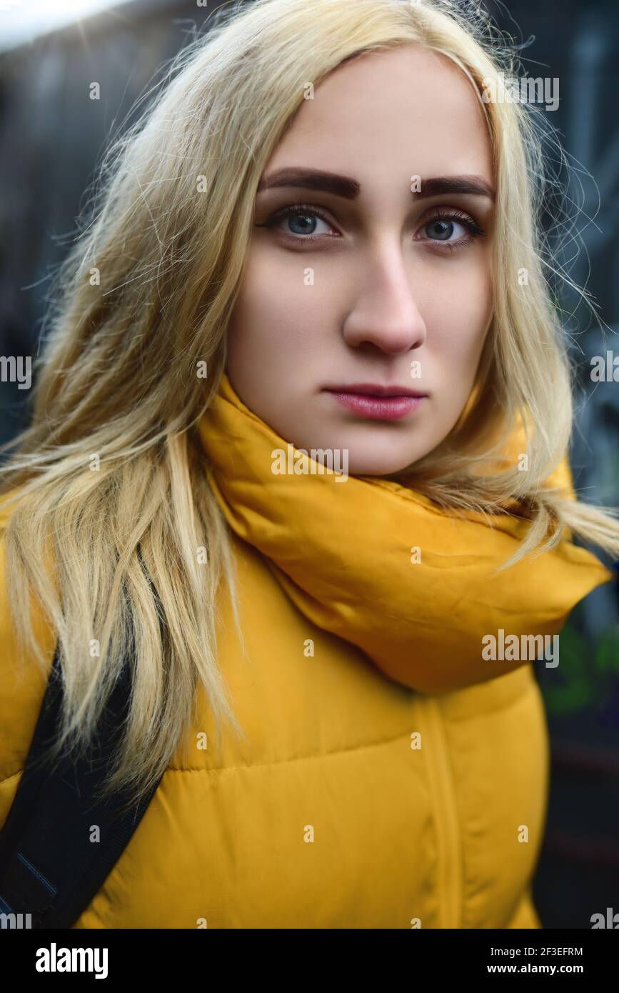 Close up portrait of blonde hipster teen girl making selfie, She is