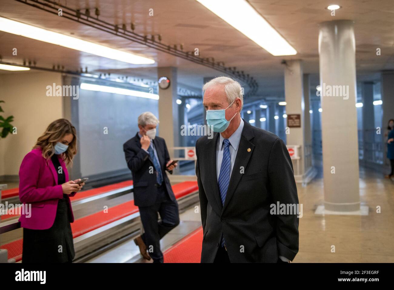 Washington, United States Of America. 16th Mar, 2021. United States Senator Ron Johnson (Republican of Wisconsin) makes his way through the Senate subway for a vote at the U.S. Capitol in Washington, DC, Tuesday, March 16, 2021. Credit: Rod Lamkey/CNP | usage worldwide Credit: dpa/Alamy Live News Stock Photo
