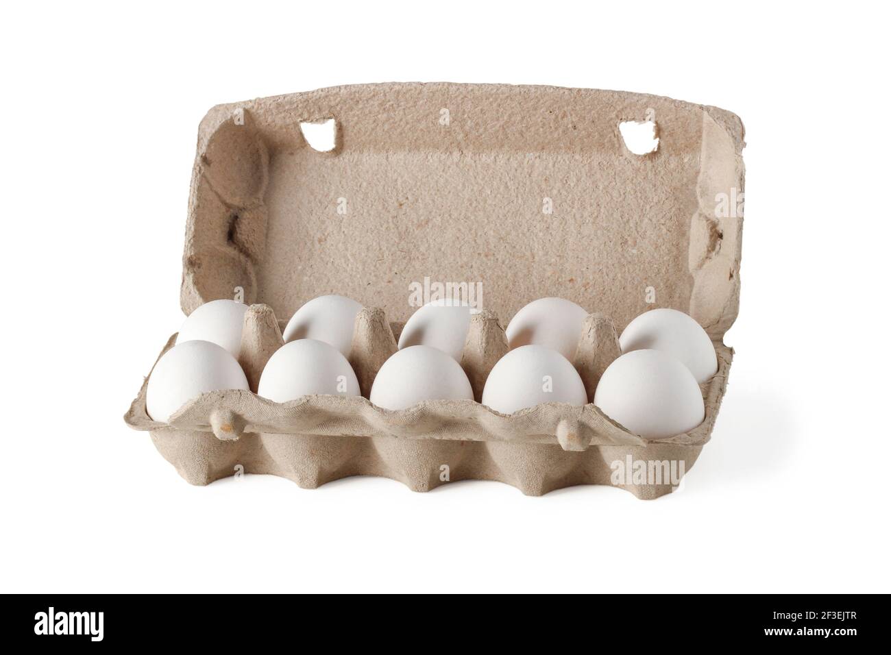 Cassette with chicken eggs isolated on white background Stock Photo