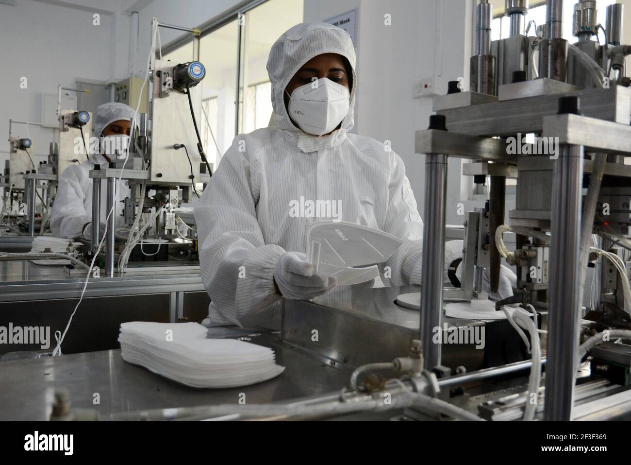Gampaha, Sri Lanka. 16th Mar, 2021. Workers make masks at a mask manufacturing factory in Gampaha, Sri Lanka, on March 16, 2021. The number of COVID-19 cases in Sri Lanka surpassed the 88,000 mark on Tuesday after over 300 new cases were registered, statistics from the Health Ministry showed here. Credit: Gayan Sameera/Xinhua/Alamy Live News Stock Photo