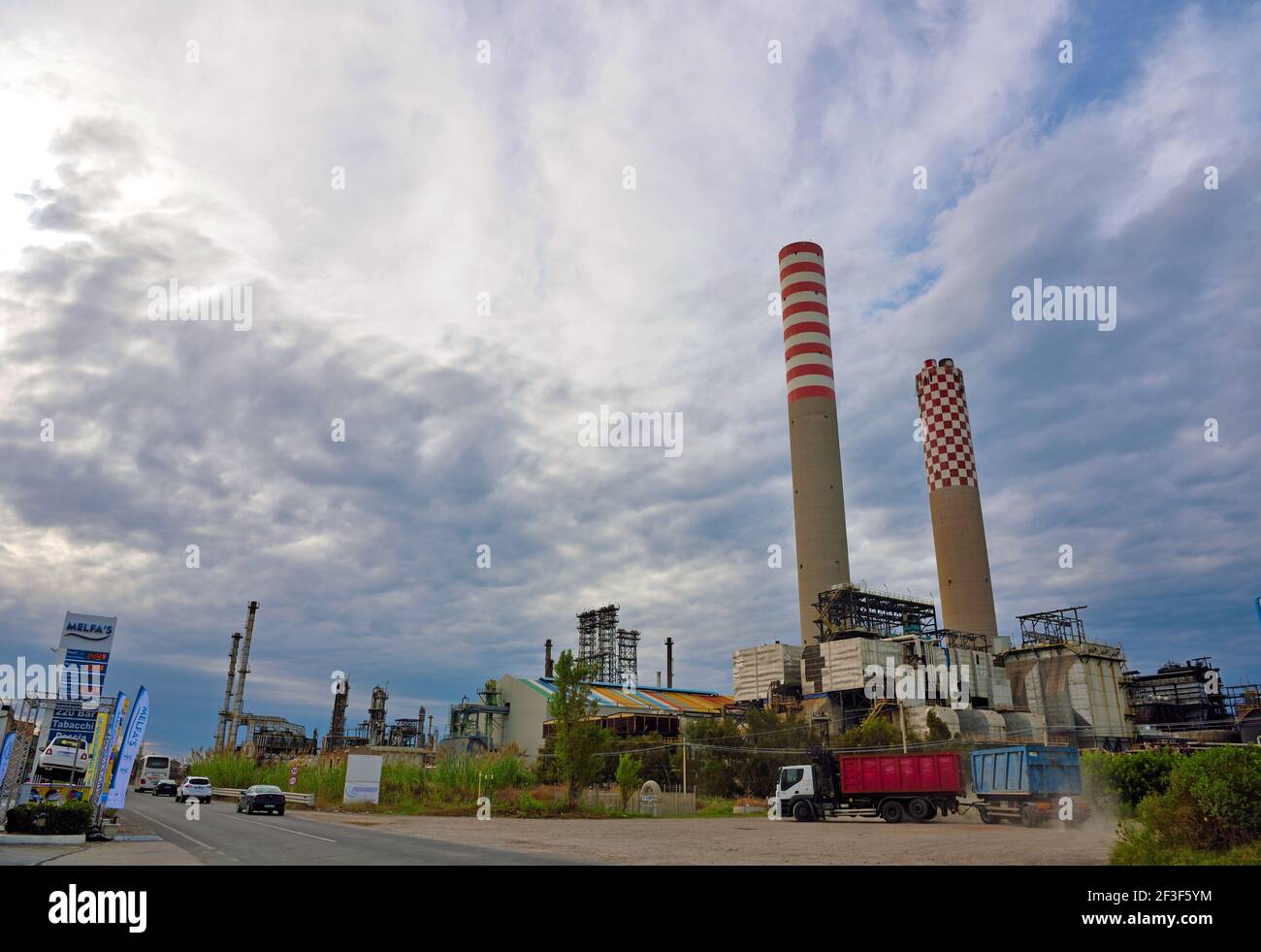 industrial area petrochemical chimneys seen from the highway Gela Italy Stock Photo