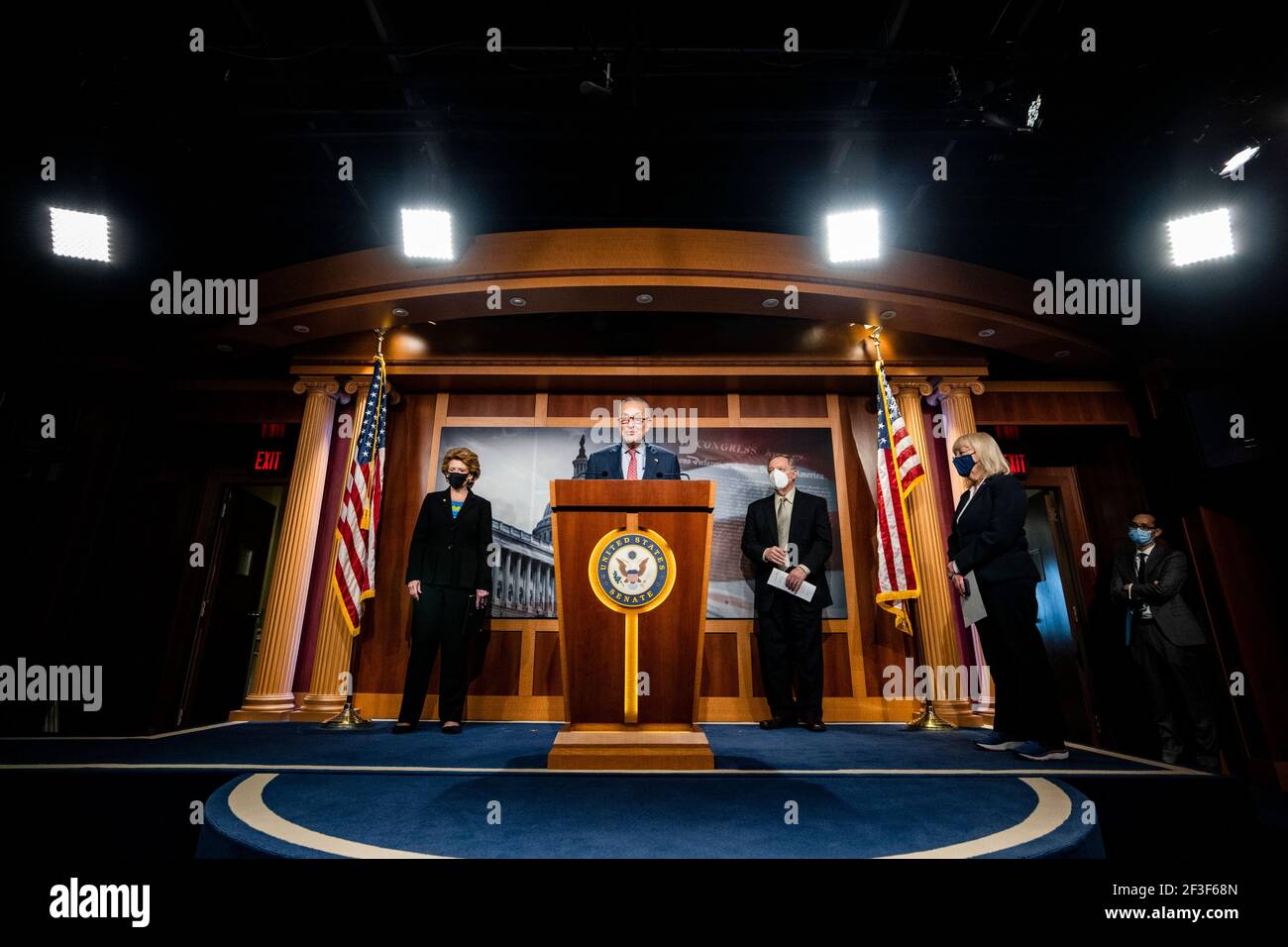 Senate Majority Leader Chuck Schumer, a Democrat from New York, speaks during a news conference with Democratic Senators (from left to right) Debbie Stabenow from Michigan, Richard Durbin from Illinois, and Patty Murray from Washington at the U.S. Capitol in Washington, D.C., U.S., on Tuesday, March 16, 2021. President Biden's next big economic package helped set off a heated debate among Republicans over whether to participate in the return of lawmakers' dedicated-spending projects, known as earmarks, a tussle that could be key to its success. Photographer: Samuel Corum/Pool/Sipa USA Stock Photo