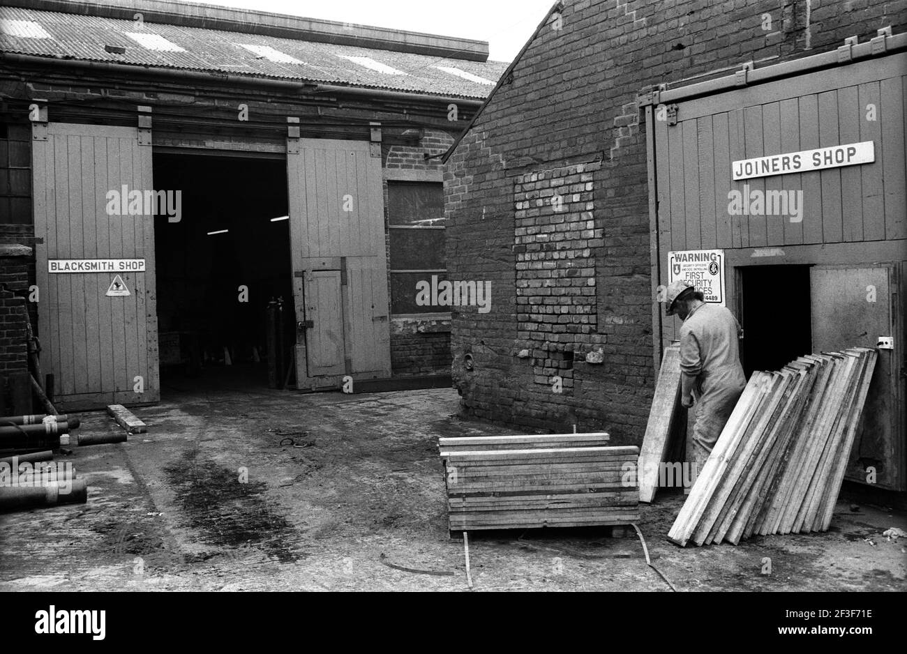 Joiner working on wooden panels on the surface at Monkwearmouth Colliery Stock Photo