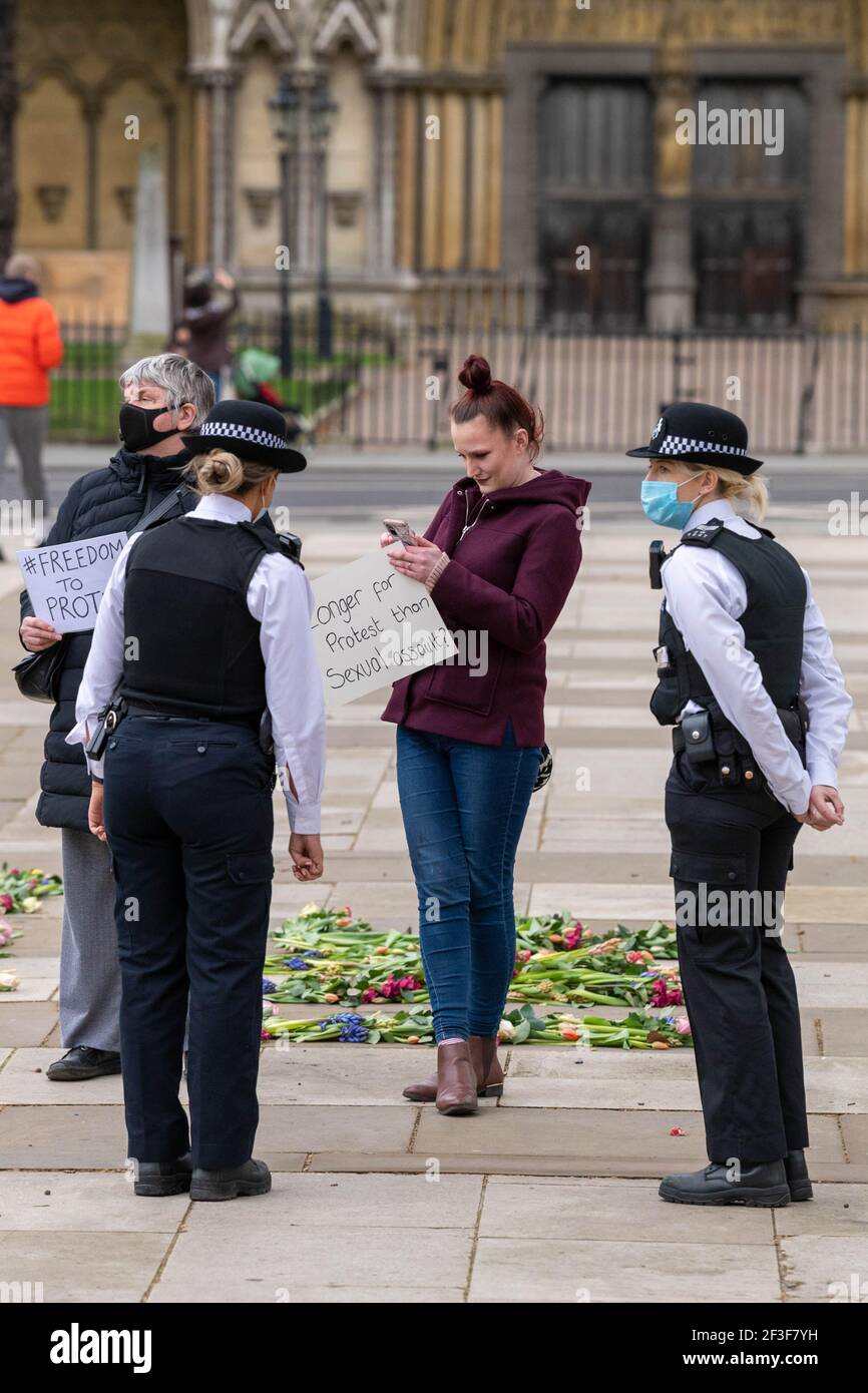 London, UK. 16th Mar, 2021. Small protests against the The Police, Crime, Sentencing and Courts Bill outside the House of Commons Met police engage with protesters Credit: Ian Davidson/Alamy Live News Stock Photo