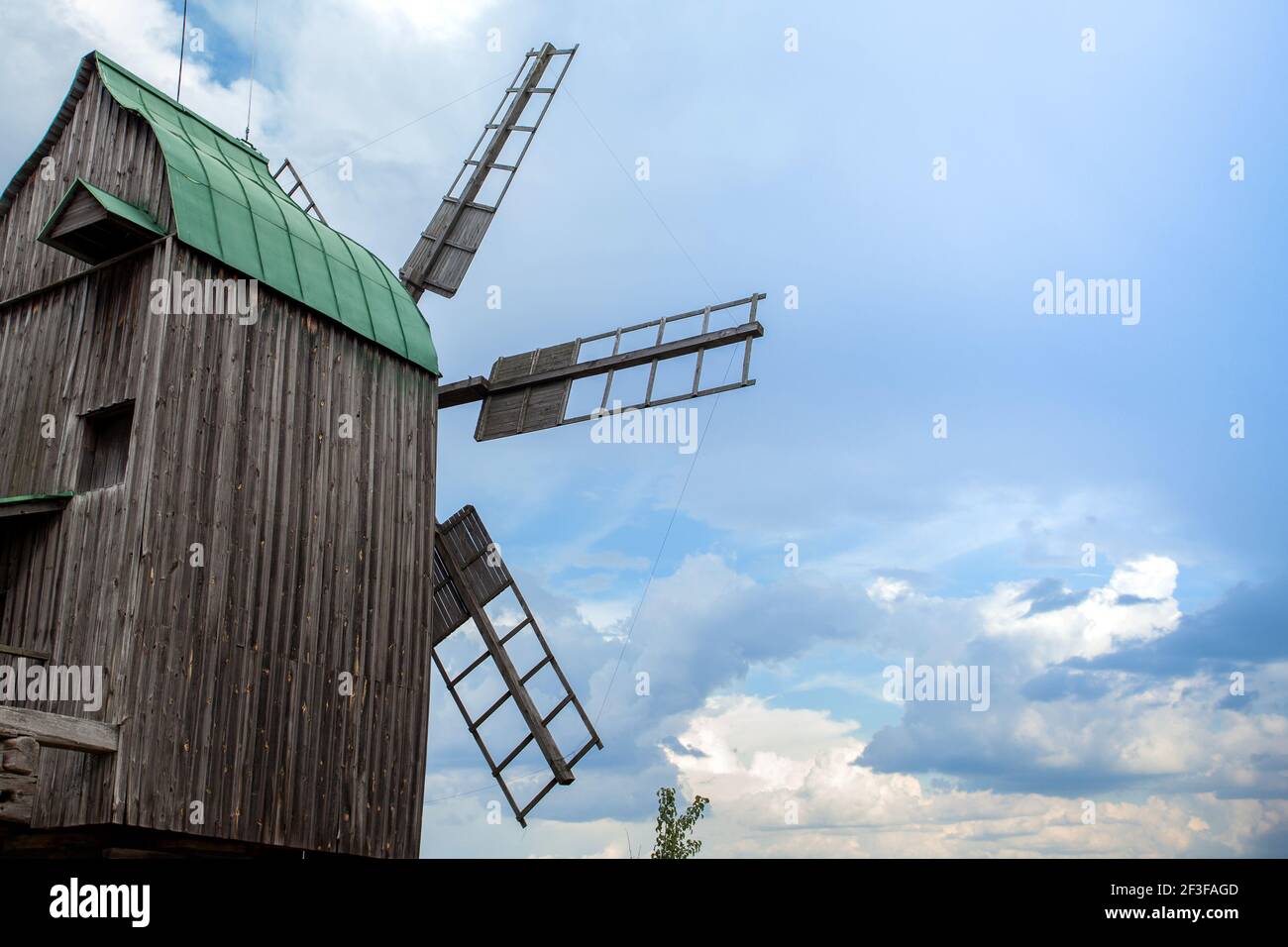 Summer landscape with an old wooden mill Stock Photo