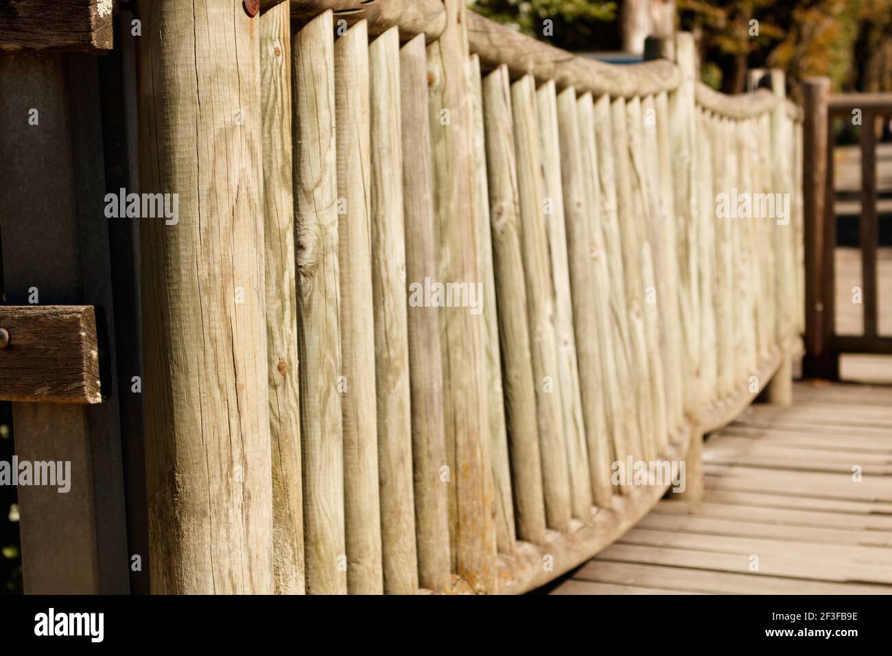 A wooden fence with sun rays falling on it Stock Photo - Alamy